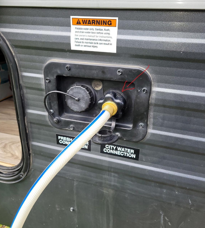 RV water line leak being repaired on-site